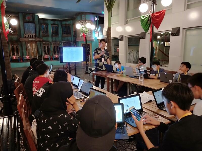 Instructor teaching coding workshop at CodeFest Singapore