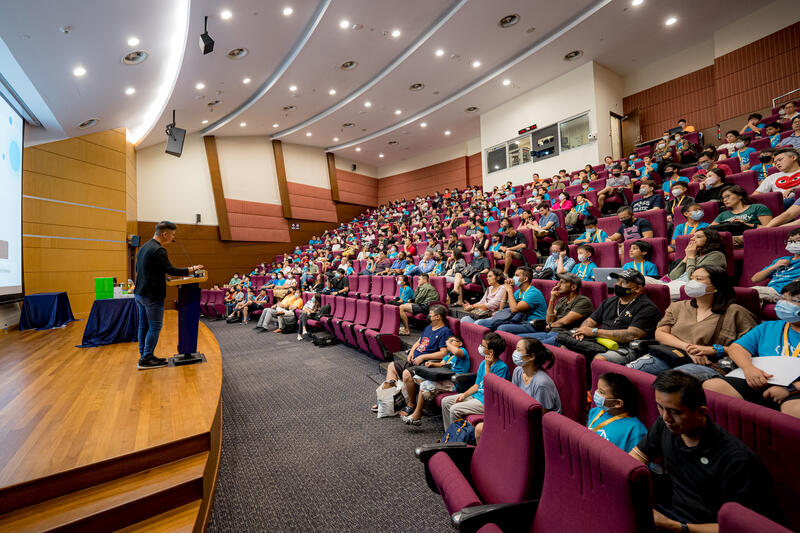 Keynote speaker presenting at CodeFest hackathon for kids