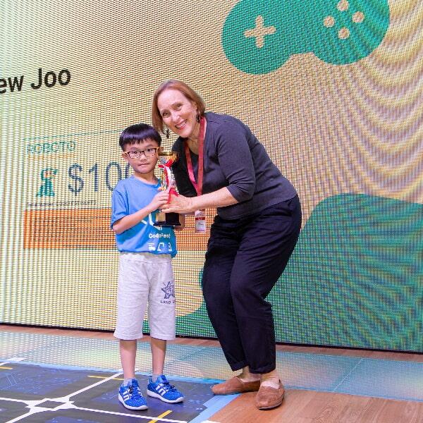Kids having fun with coding activities at CodeFest Singapore