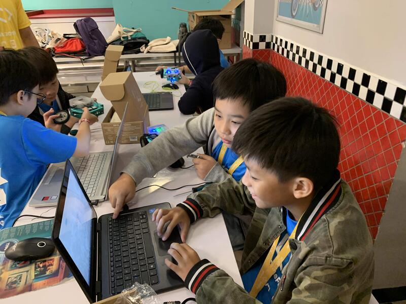 Students enjoying coding activities at CodeFest event
