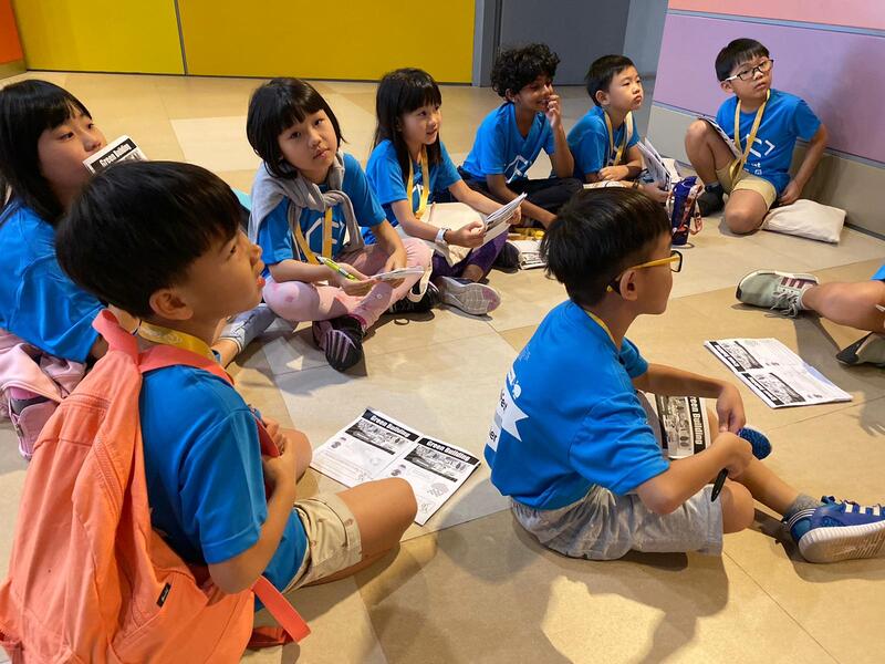 Young programmers collaborating at CodeFest hackathon