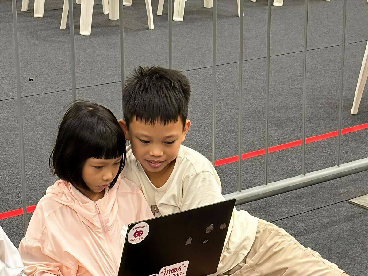 Young participants coding together at RoboCup 2026