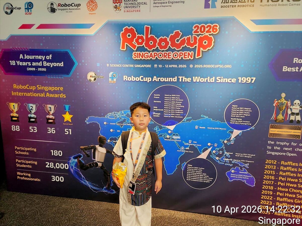 Student at RoboCup 2026 photo wall