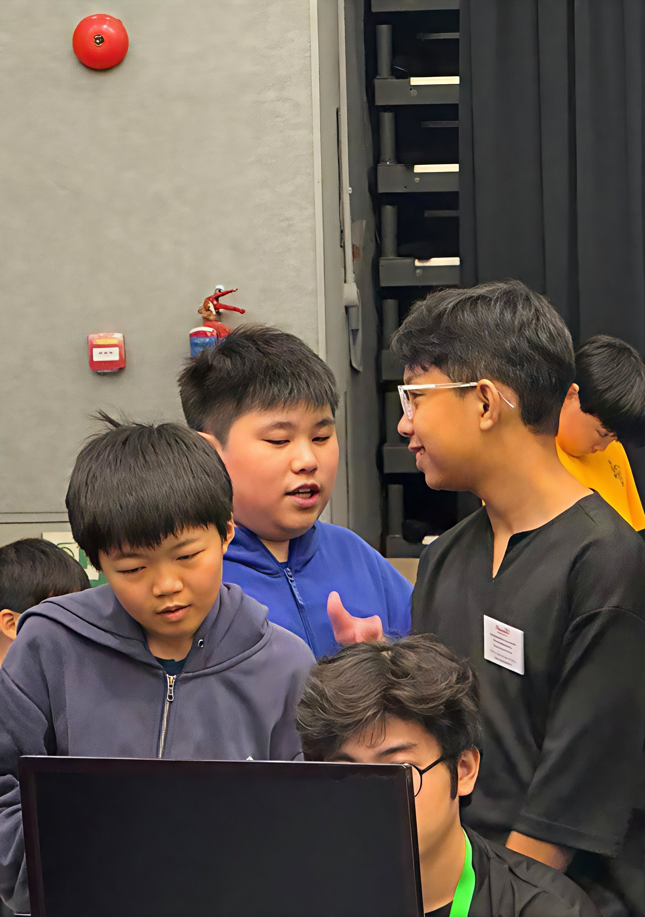 Students discussing strategy at RoboCup 2026 competition