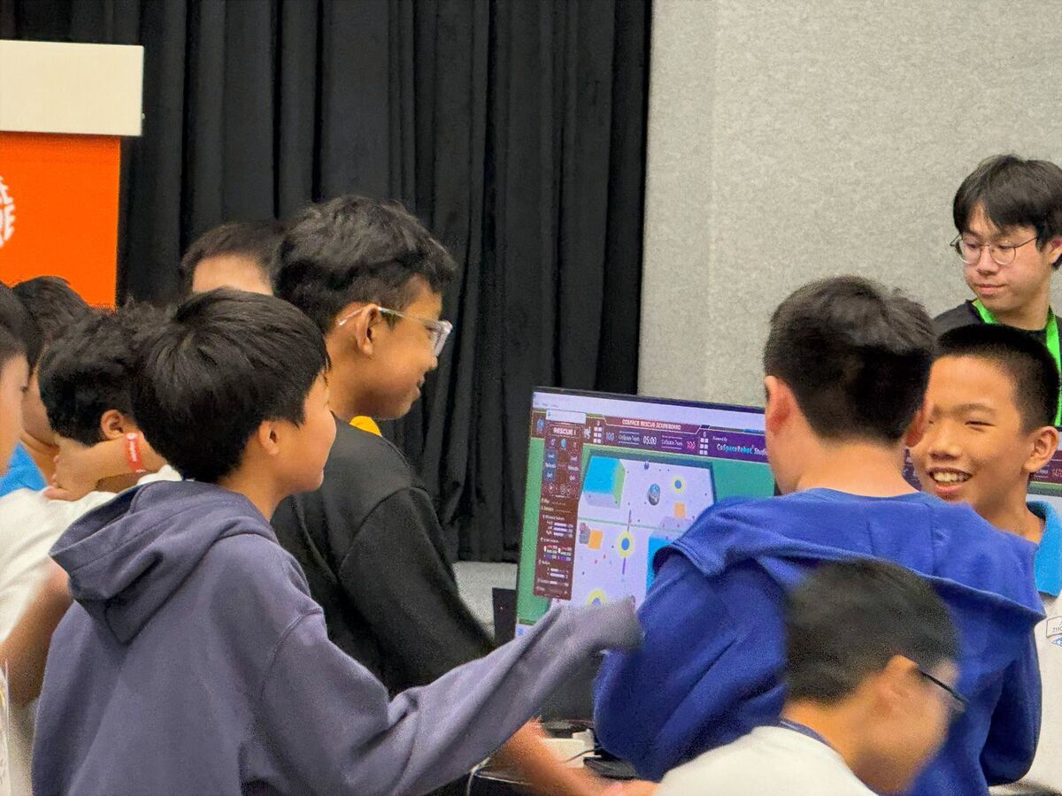 Students enjoying competition at Science Centre Singapore