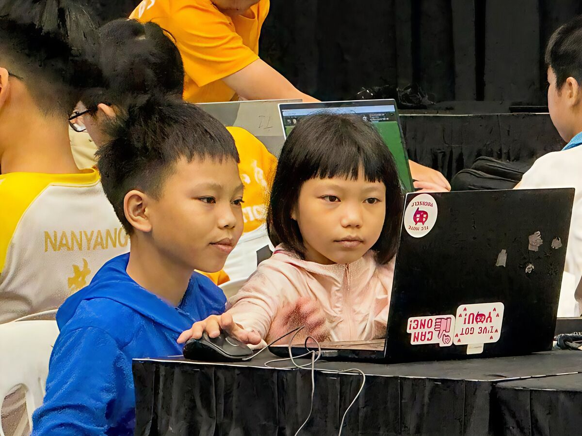 Students focused on their CoSpace Rescue coding