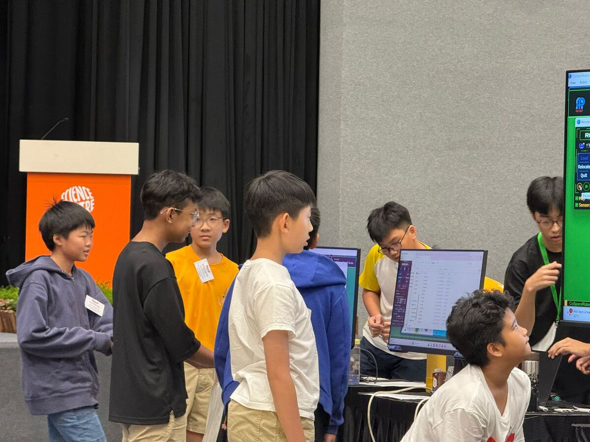 Students gathering at competition station at RoboCup 2026