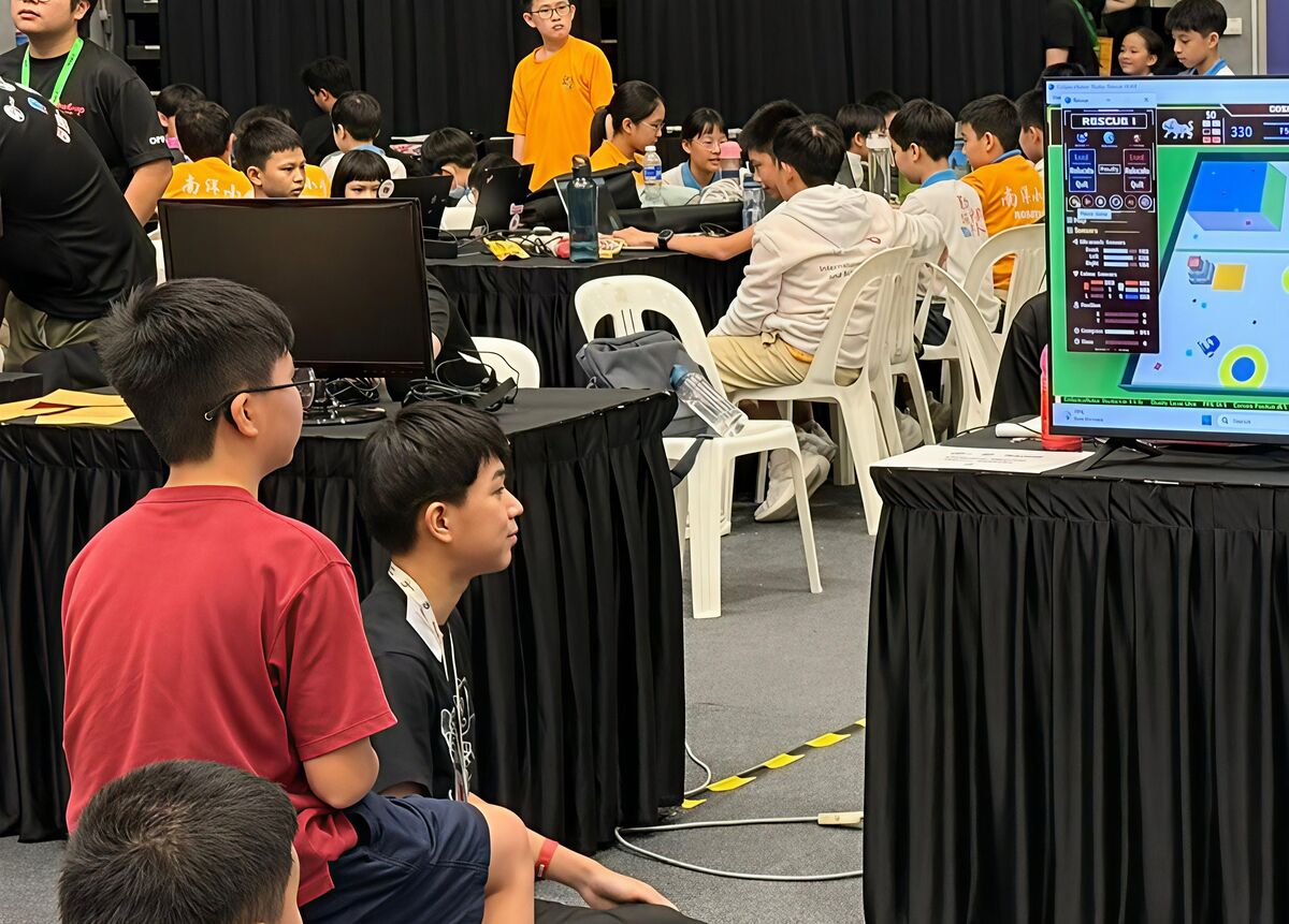 Students watching CoSpace Rescue match on screen