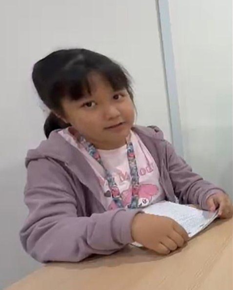 Young girl student at desk during RoboCup 2026