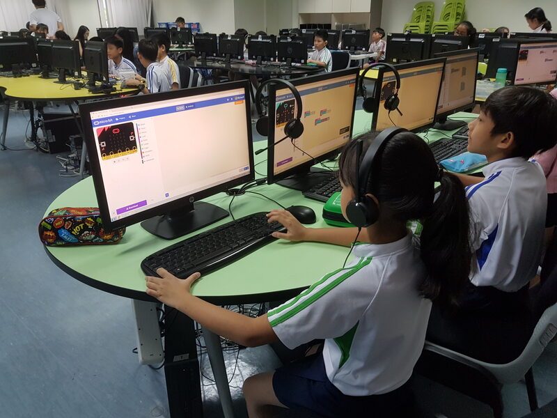 Students in a coding and robotics engagement at a Singapore school