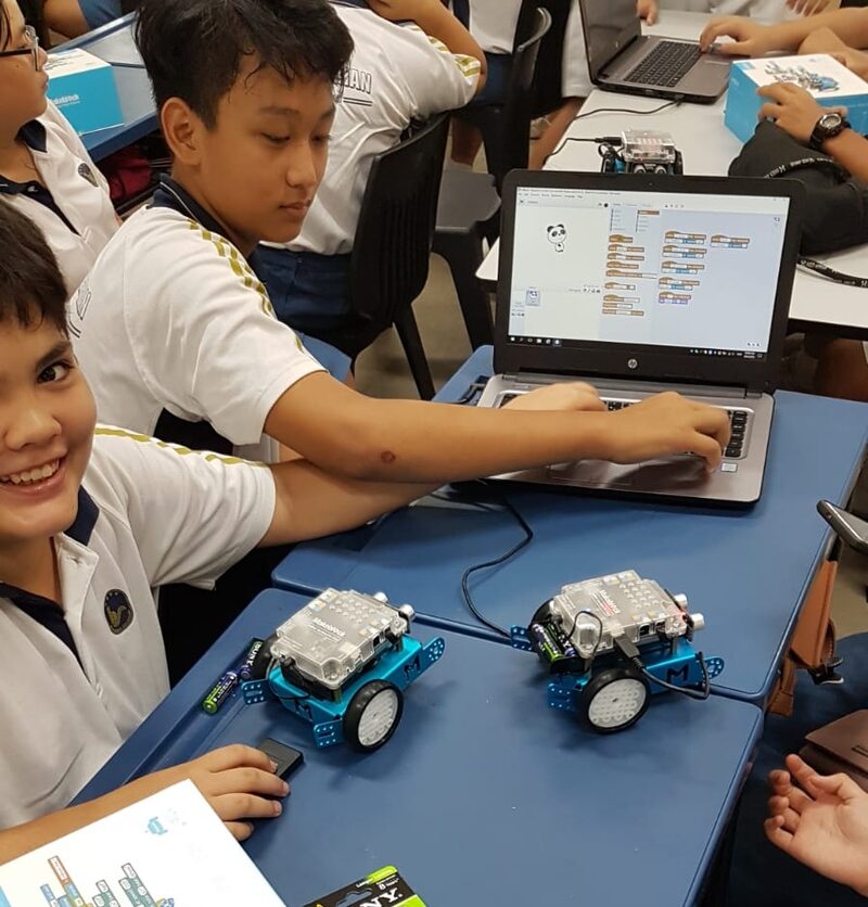 Students working together on a robotics challenge