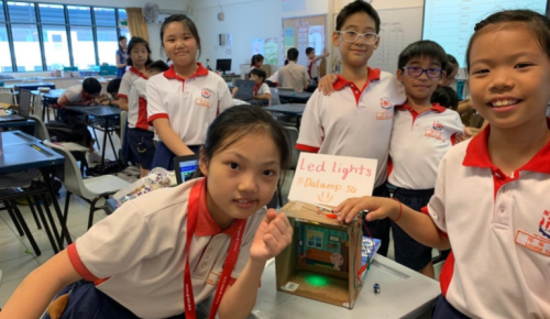 Students showcasing their LED Lights project