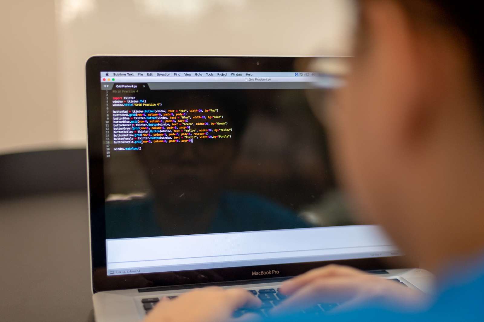 Student coding with Python